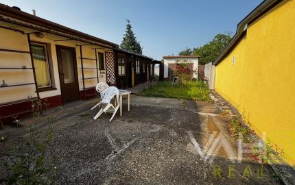 Rodinný dom s potenciálom v srdci obce Cífer