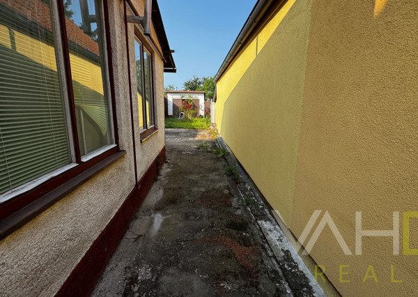 Rodinný dom s potenciálom v srdci obce Cífer