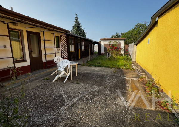 Rodinný dom s potenciálom v srdci obce Cífer